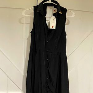 Black sleeveless dress button up & gold detail at collar. Size small.